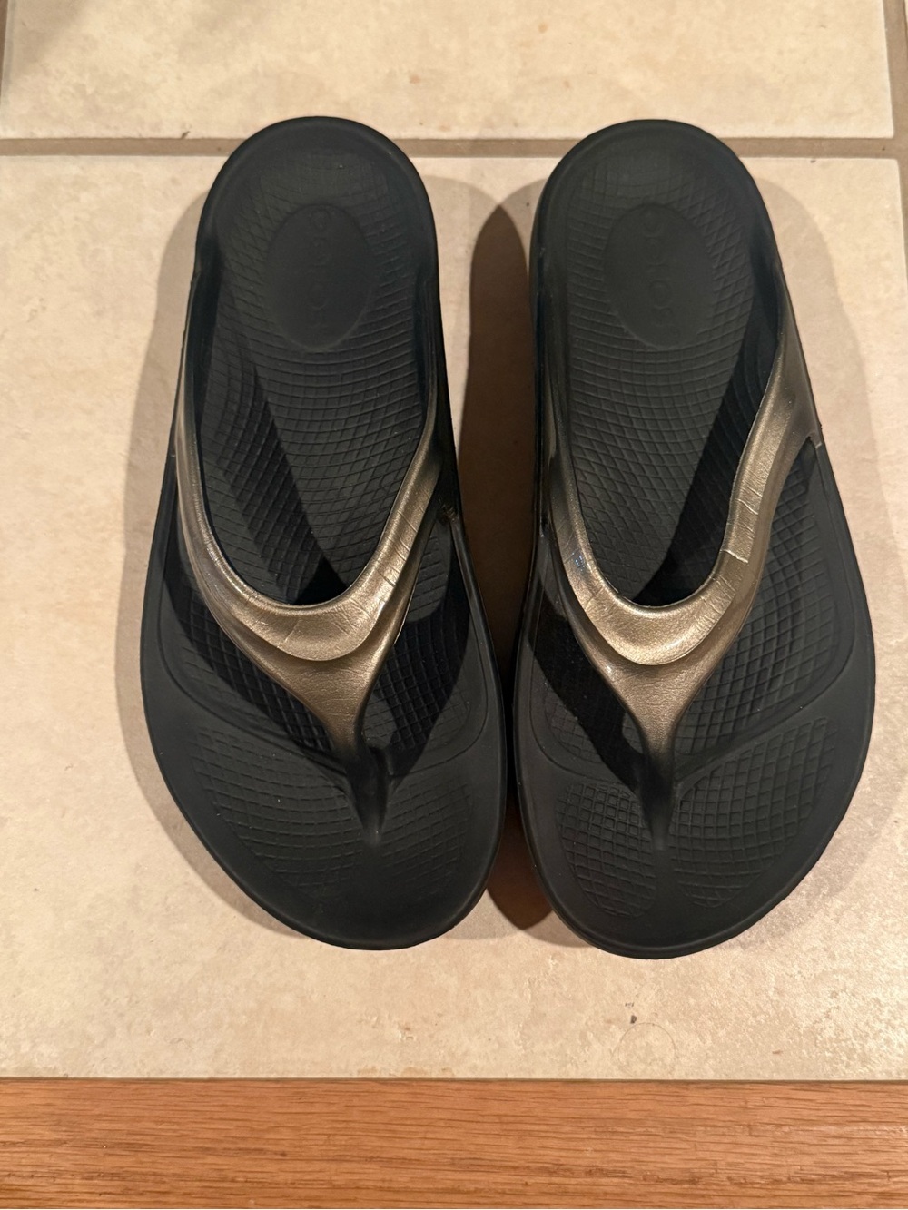 OOFOS Black Sandals with Metallic Gold Straps
